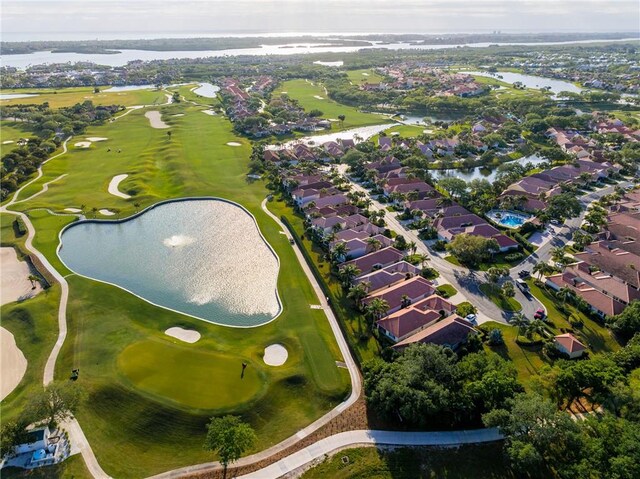 1725 Victoria Cir, Vero Beach, FL 32967 - bird's eye view featuring golf course view, a water view, and a residential view
