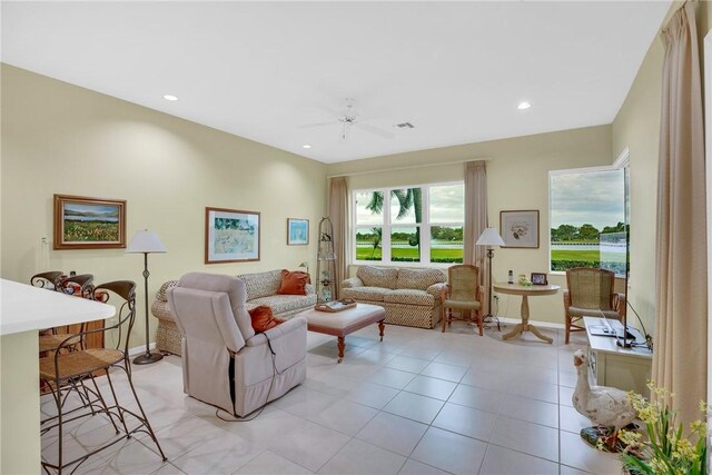1725 Victoria Cir, Vero Beach, FL 32967 - living room featuring light tile patterned flooring, recessed lighting, baseboards, and a ceiling fan