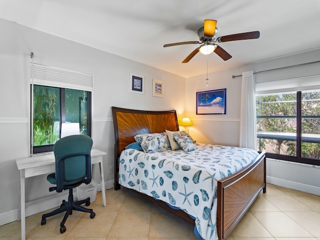 bedroom with light tile patterned floors and ceiling fan