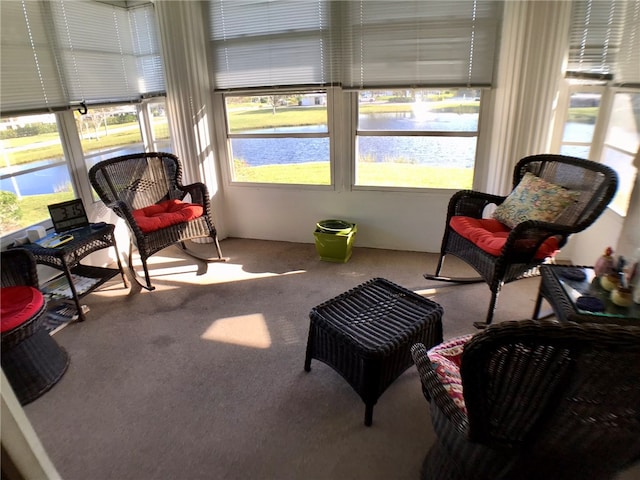 sunroom with a water view