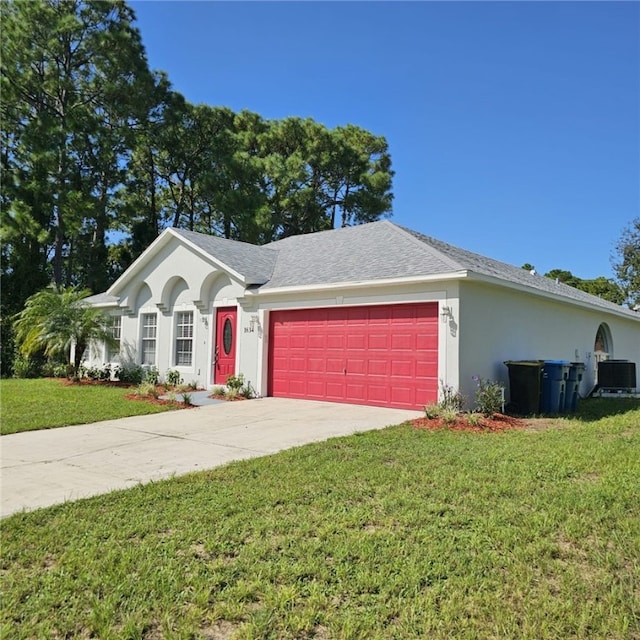 ranch-style home with cooling unit, a front lawn, and a garage