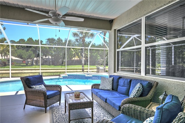 view of swimming pool with a patio, outdoor lounge area, a lanai, and ceiling fan