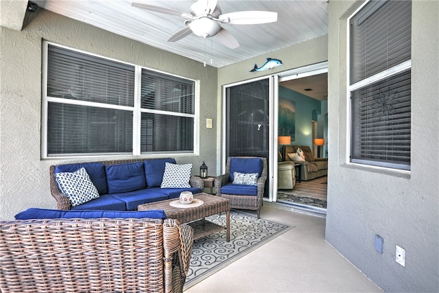 view of patio / terrace featuring an outdoor living space and ceiling fan