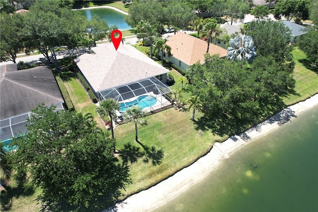 birds eye view of property with a water view