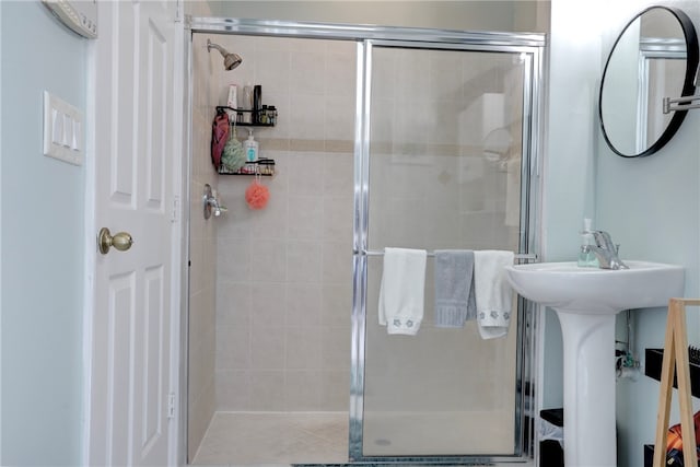 bathroom with an enclosed shower