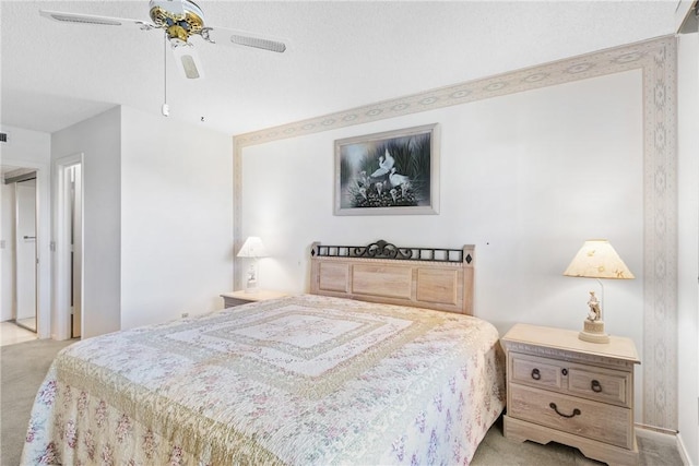 carpeted bedroom featuring a ceiling fan