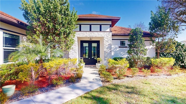 view of front facade featuring french doors