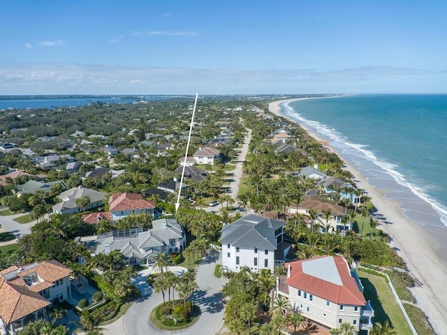 aerial view with a view of the beach and a water view