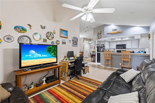 living room with high vaulted ceiling, light tile patterned flooring, a textured ceiling, and ceiling fan