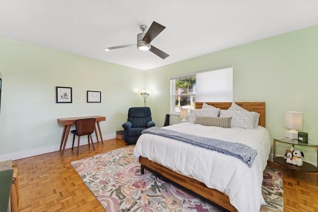 bedroom with parquet flooring and ceiling fan