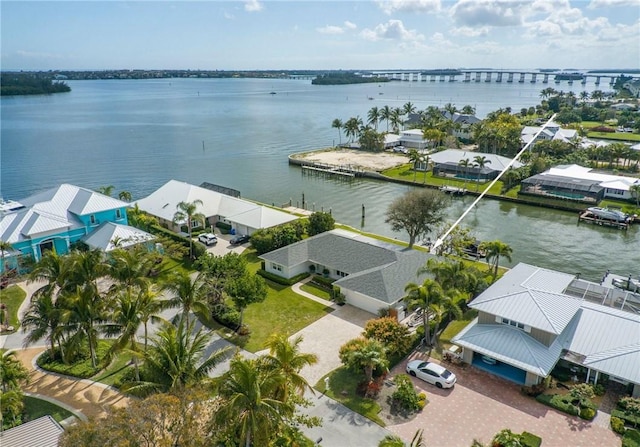 bird's eye view with a water view