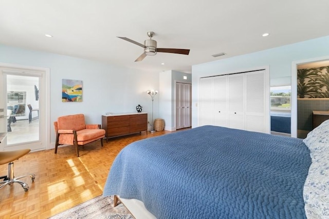 bedroom featuring parquet floors and ceiling fan