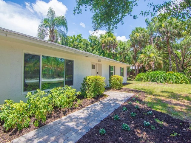 6345 7th Ln, Vero Beach, FL 32968 - entrance to property featuring stucco siding