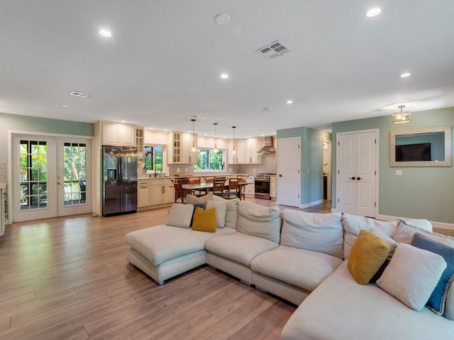 6345 7th Ln, Vero Beach, FL 32968 - living area with recessed lighting and light wood finished floors