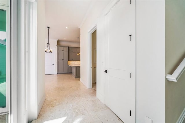 corridor featuring recessed lighting and crown molding