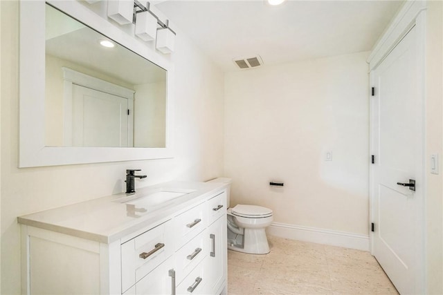 bathroom with vanity, baseboards, visible vents, recessed lighting, and toilet