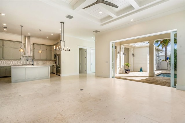 unfurnished living room featuring beamed ceiling, a ceiling fan, visible vents, and coffered ceiling