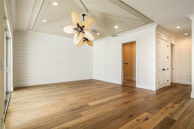 empty room featuring recessed lighting, light wood-type flooring, visible vents, and a ceiling fan