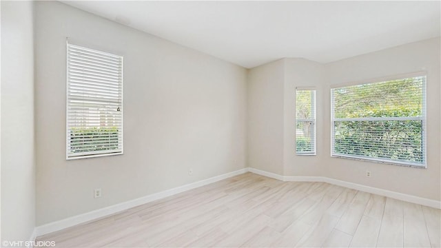 652 Hatteras Ct SW, Vero Beach, FL 32968 - unfurnished room featuring baseboards and wood finished floors