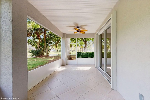 652 Hatteras Ct SW, Vero Beach, FL 32968 - unfurnished sunroom with a ceiling fan