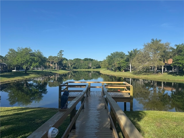 652 Hatteras Ct SW, Vero Beach, FL 32968 - view of dock with a water view