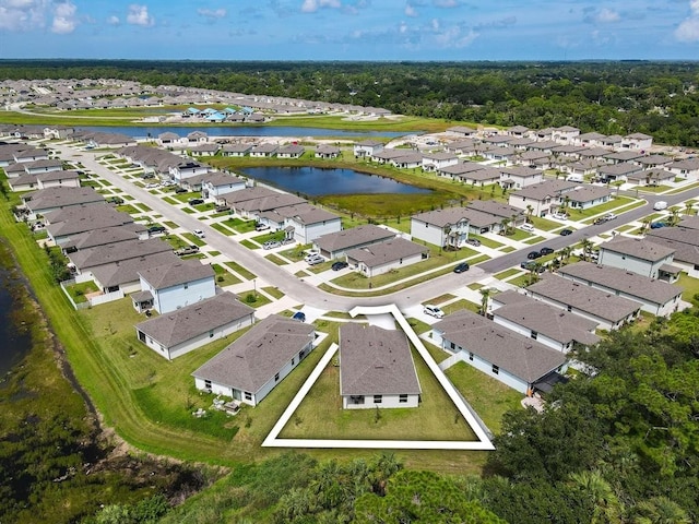 drone / aerial view with a water view