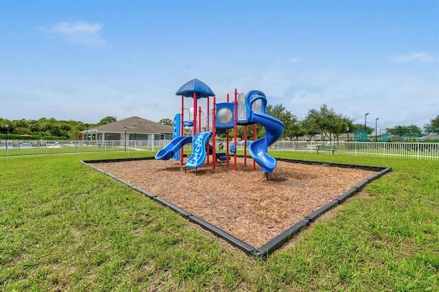 view of playground with a yard