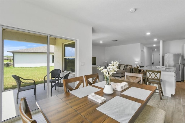 dining area featuring light hardwood / wood-style flooring