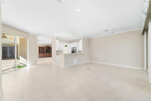 unfurnished living room with ornamental molding and ceiling fan