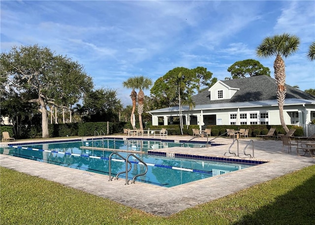 view of pool featuring a patio