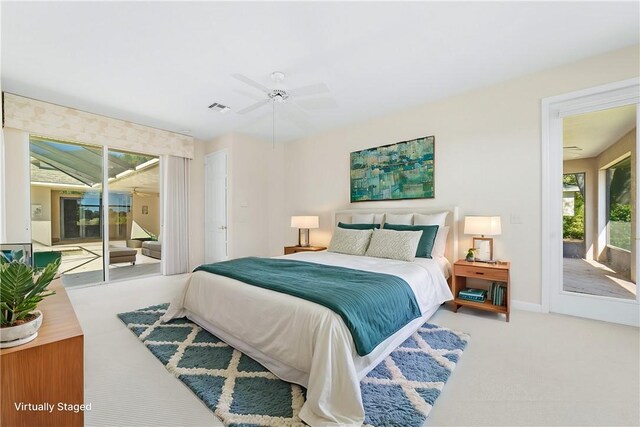 carpeted bedroom with access to outside and ceiling fan