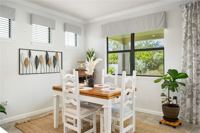 dining area featuring ornamental molding