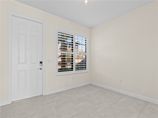 view of tiled spare room