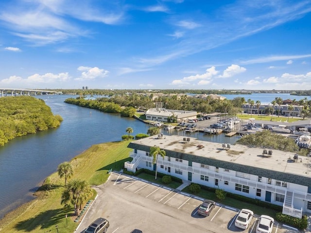 birds eye view of property featuring a water view