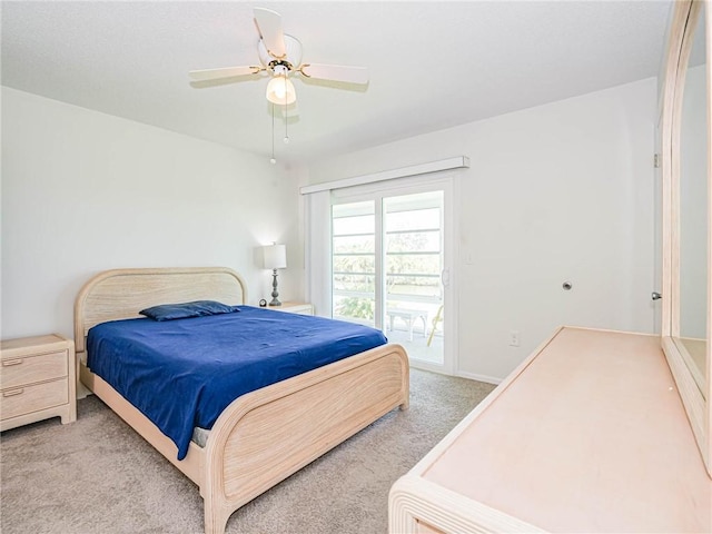2800 Indian River Blvd Unit L8, Vero Beach, FL 32960 - bedroom with ceiling fan, access to exterior, and light colored carpet