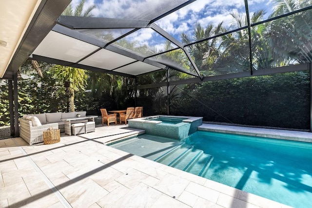 view of pool with an in ground hot tub, an outdoor hangout area, a patio, and a lanai