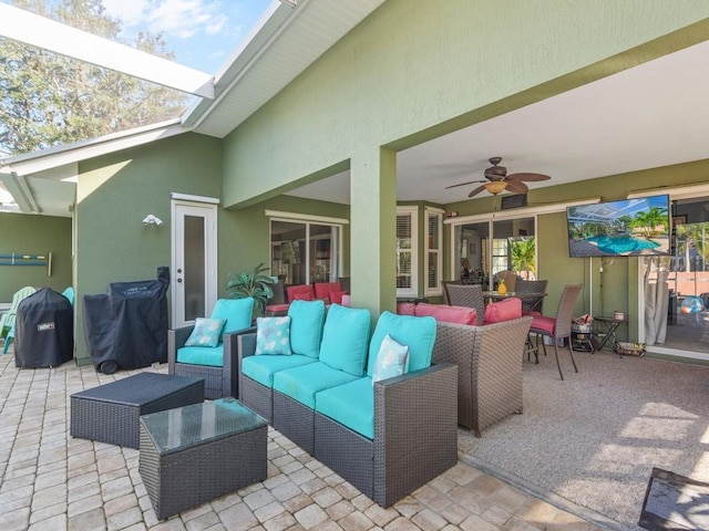 view of patio / terrace with ceiling fan and outdoor lounge area