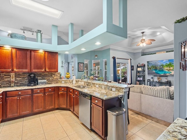 kitchen featuring stainless steel dishwasher, ornamental molding, kitchen peninsula, and sink