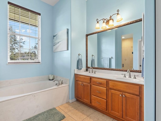 bathroom featuring plus walk in shower, tile patterned floors, and vanity