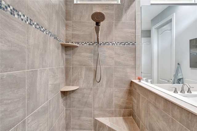 bathroom with a tile shower