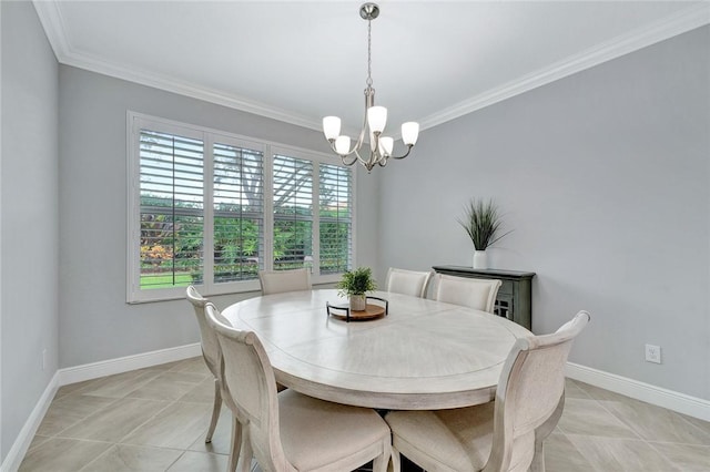 tiled dining room featuring a chandelier and crown molding