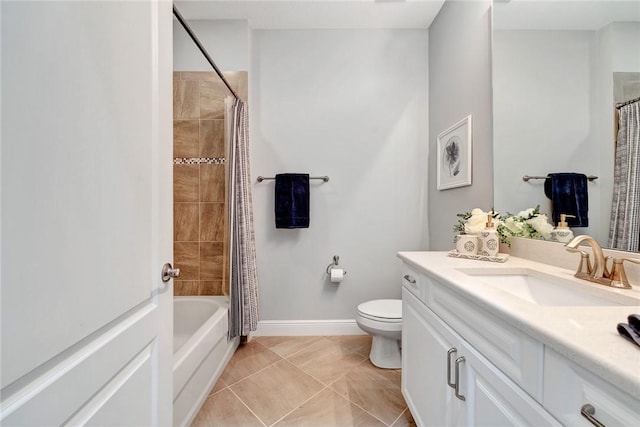 full bathroom featuring shower / bathtub combination with curtain, tile patterned flooring, vanity, and toilet