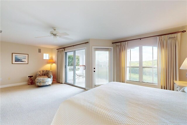 carpeted bedroom featuring access to exterior and ceiling fan