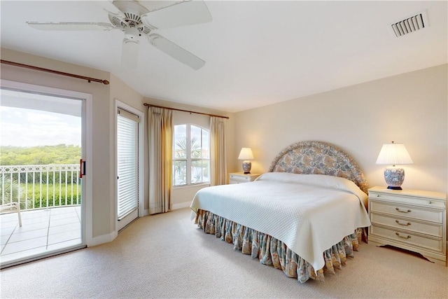 carpeted bedroom with access to exterior and ceiling fan