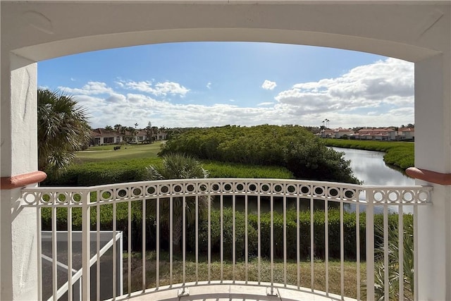 balcony featuring a water view