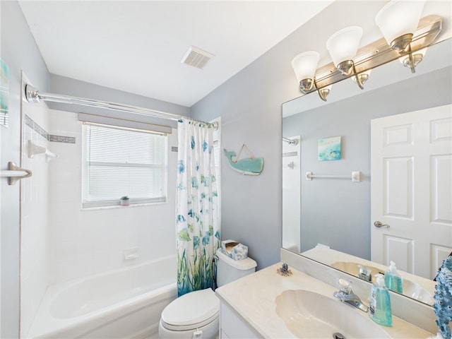 bathroom featuring visible vents, toilet, vanity, and shower / bathtub combination with curtain