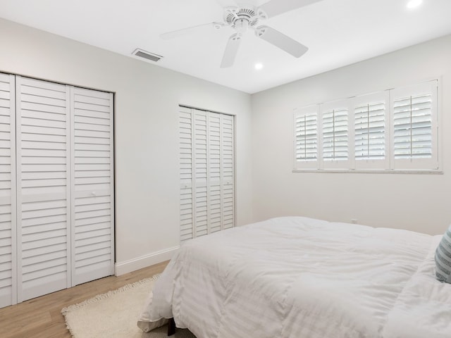 bedroom featuring light hardwood / wood-style floors and ceiling fan