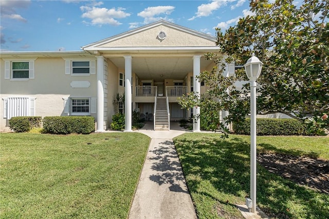 720 Lake Orchid Cir Unit 202, Vero Beach, FL 32962 - view of property featuring stairs