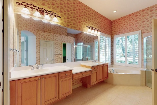 9515 E Maiden Ct, Vero Beach, FL 32963 - full bathroom featuring wallpapered walls, a shower stall, and a garden tub