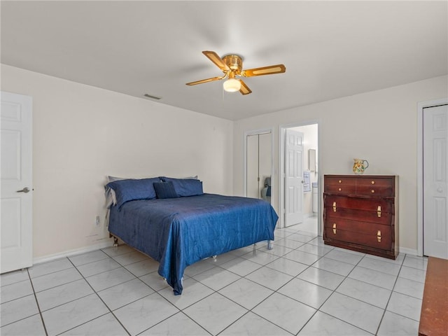 bedroom featuring ceiling fan and light tile patterned flooring